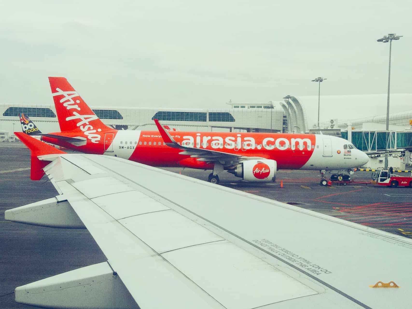 An Air Asia plane at Kuala Lumpur airport in Malaysia // travelmermaid.com