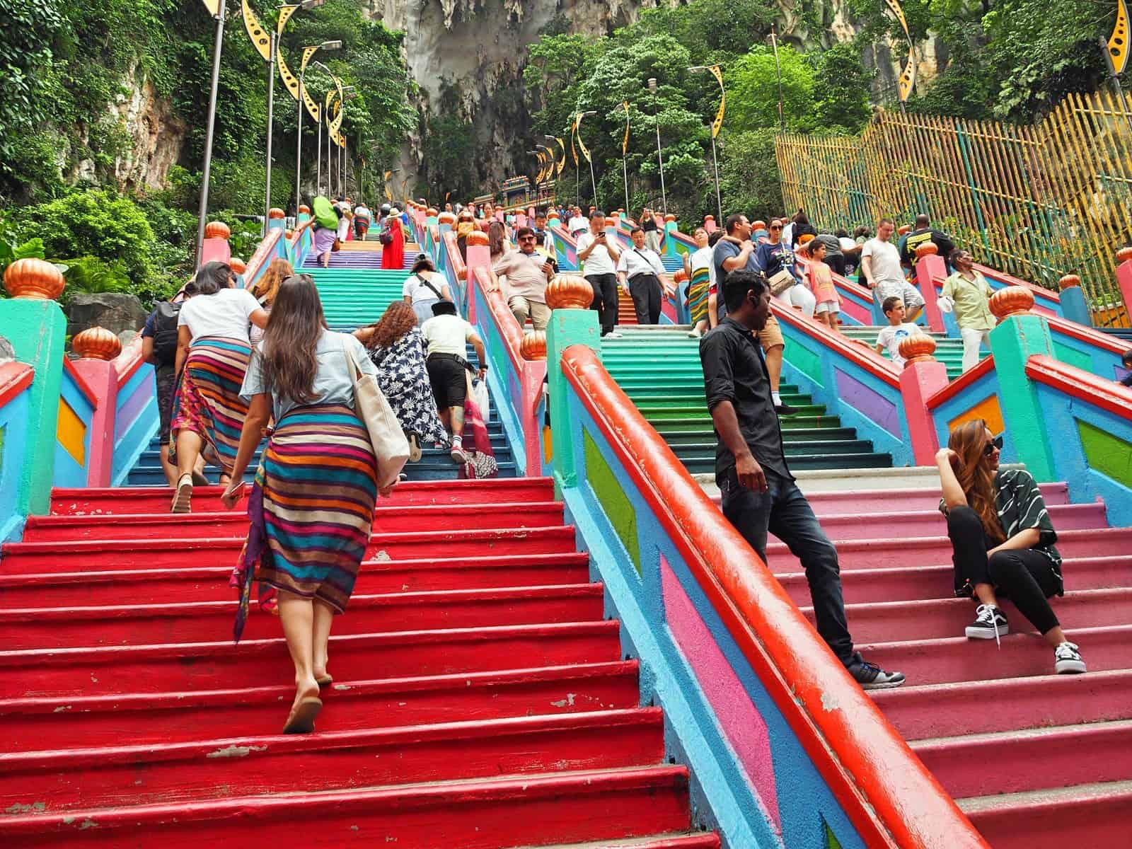 Climbing the stairs at Batu Caves in Kuala Lumpur // travelmermaid.com
