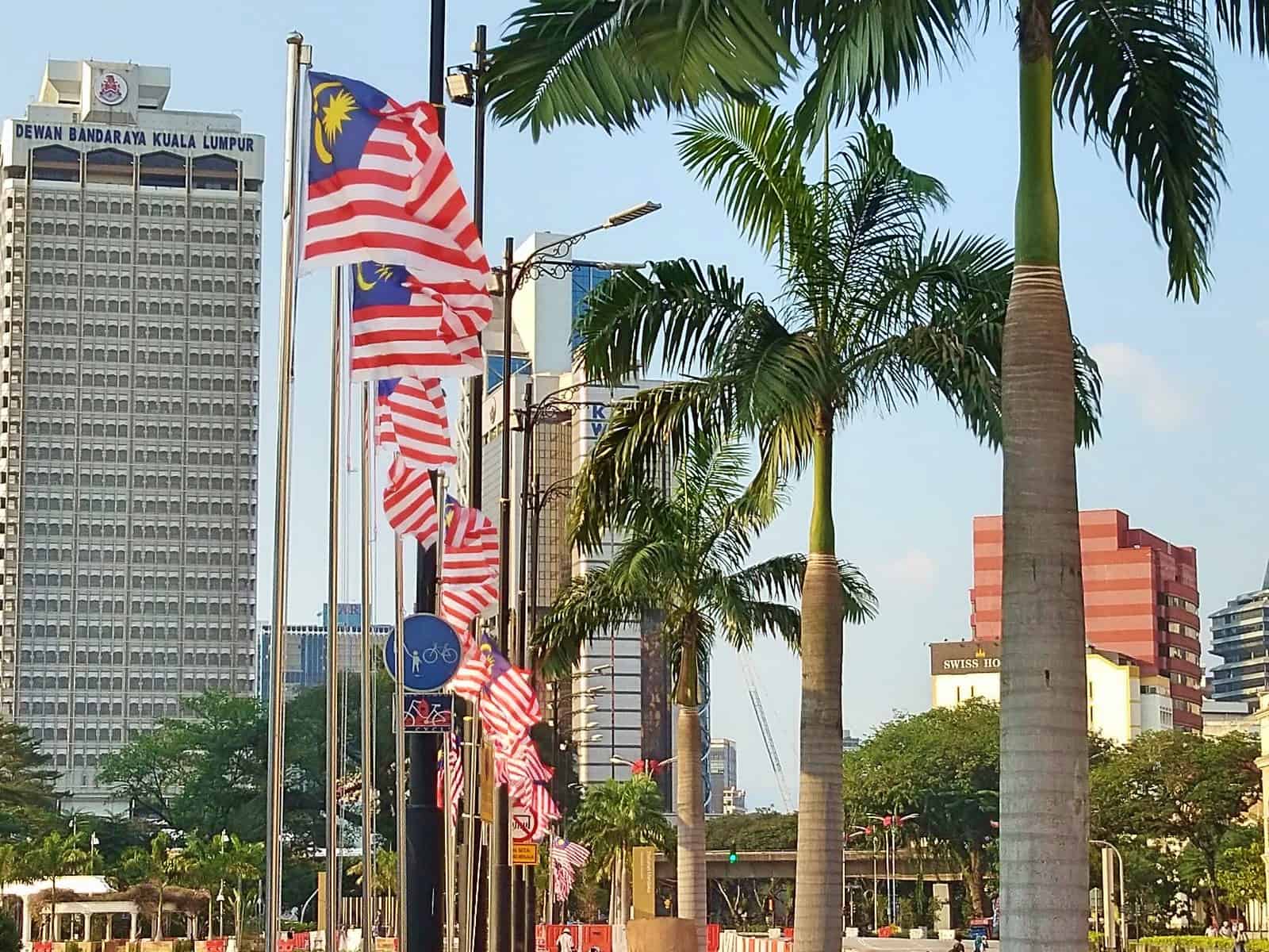 A flag-lined street in KLCC, Kuala Lumpur // travelmermaid.com