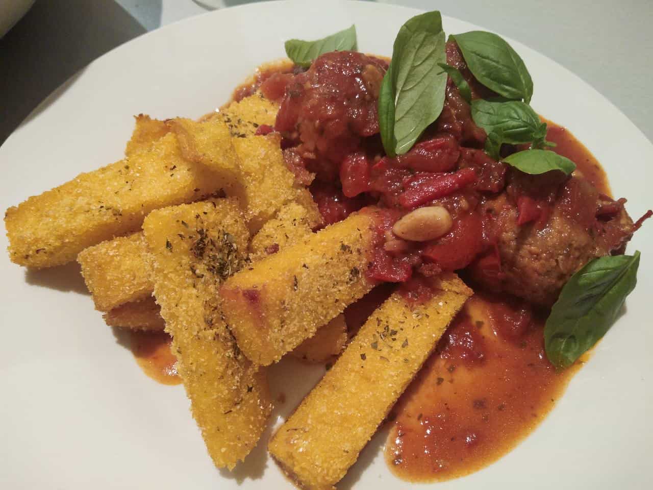 Reduce your food's carbon footprint by eating more vegetarian meals // My plant-based meatballs with polenta chips // travelmermaid.com