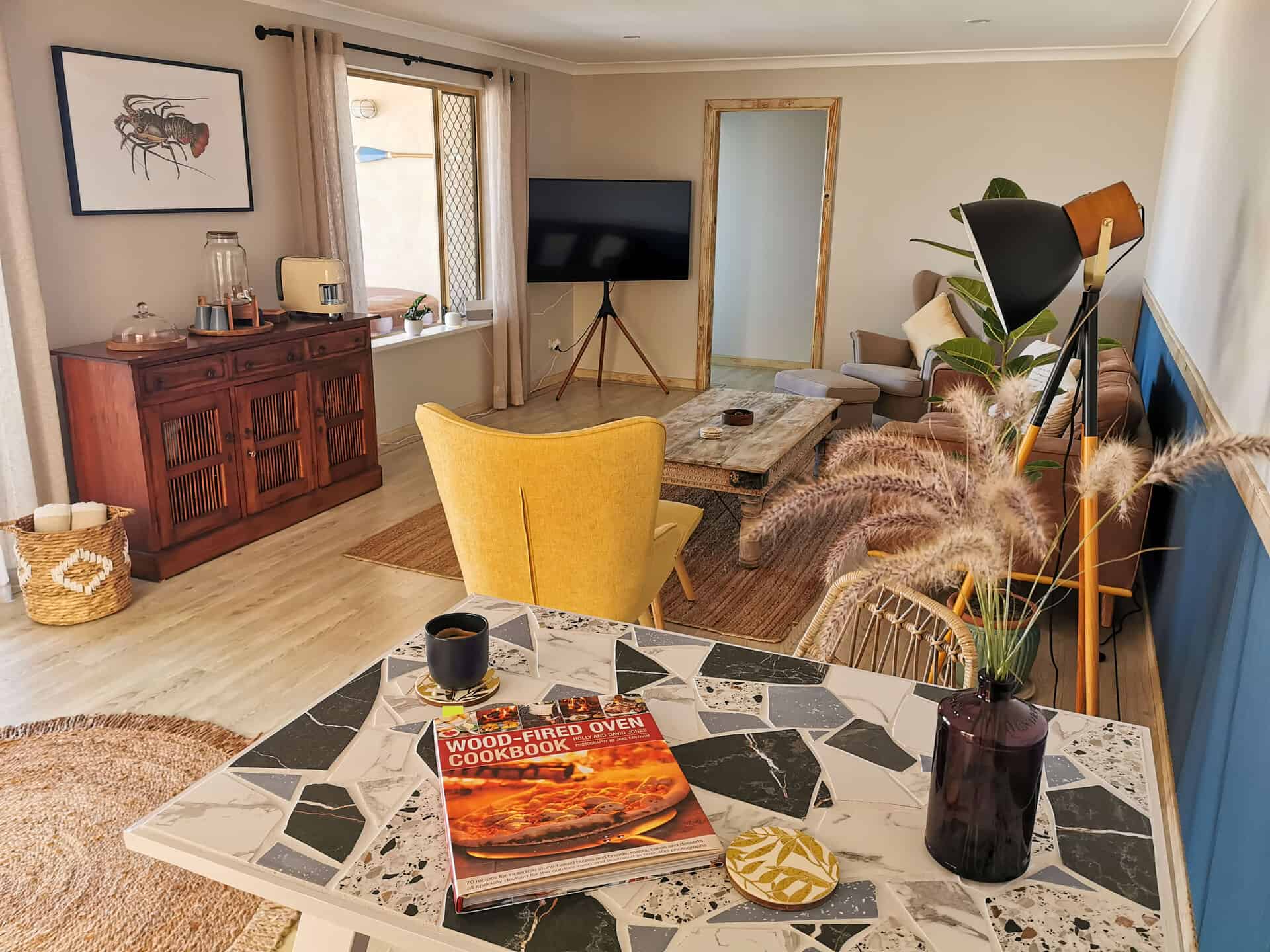 The living room at The Glass House WA Airbnb in Greenough, Western Australia