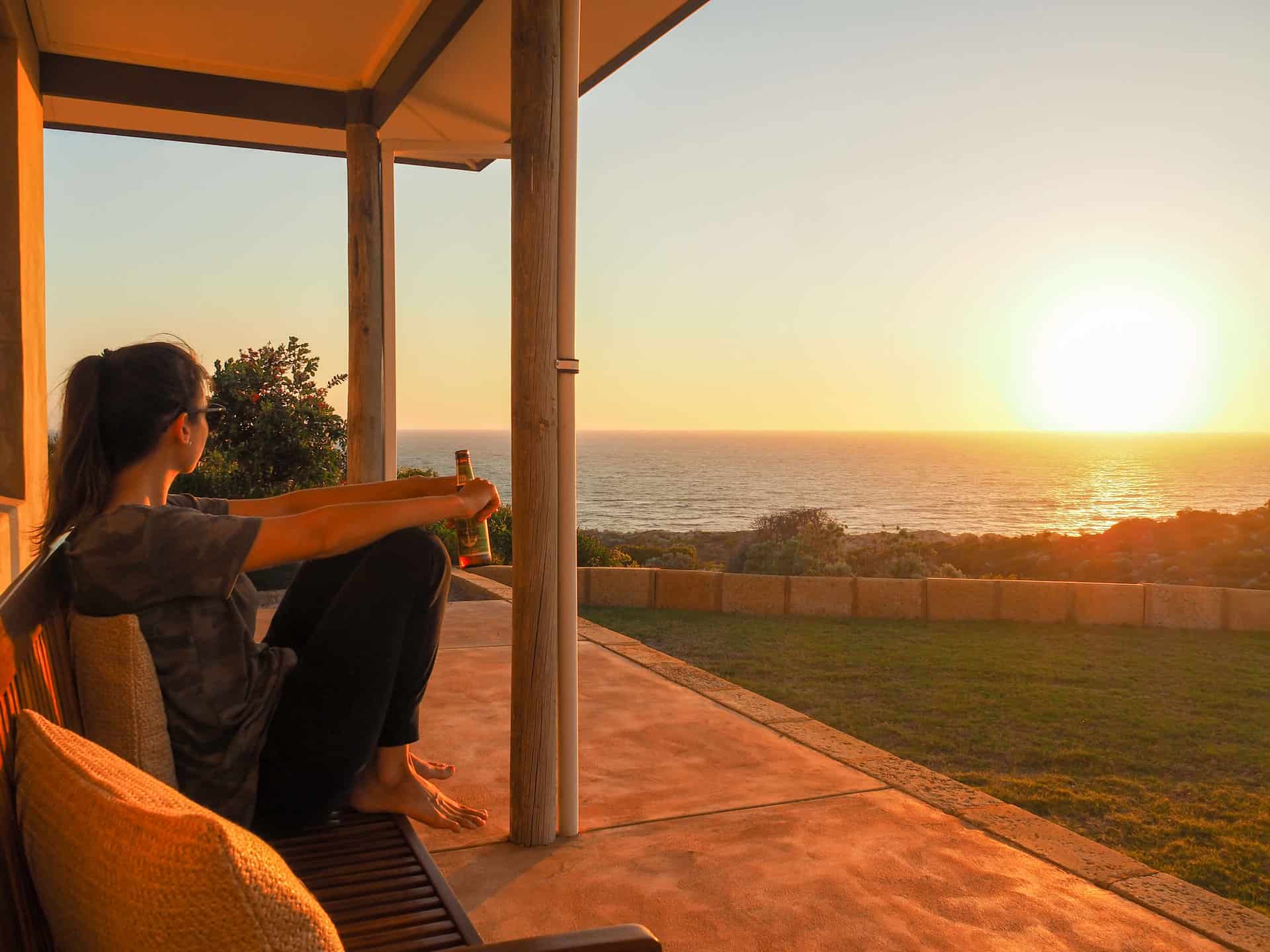 Watching an Indian Ocean sunset at The Glass House WA Airbnb in Greenough, Western Australia