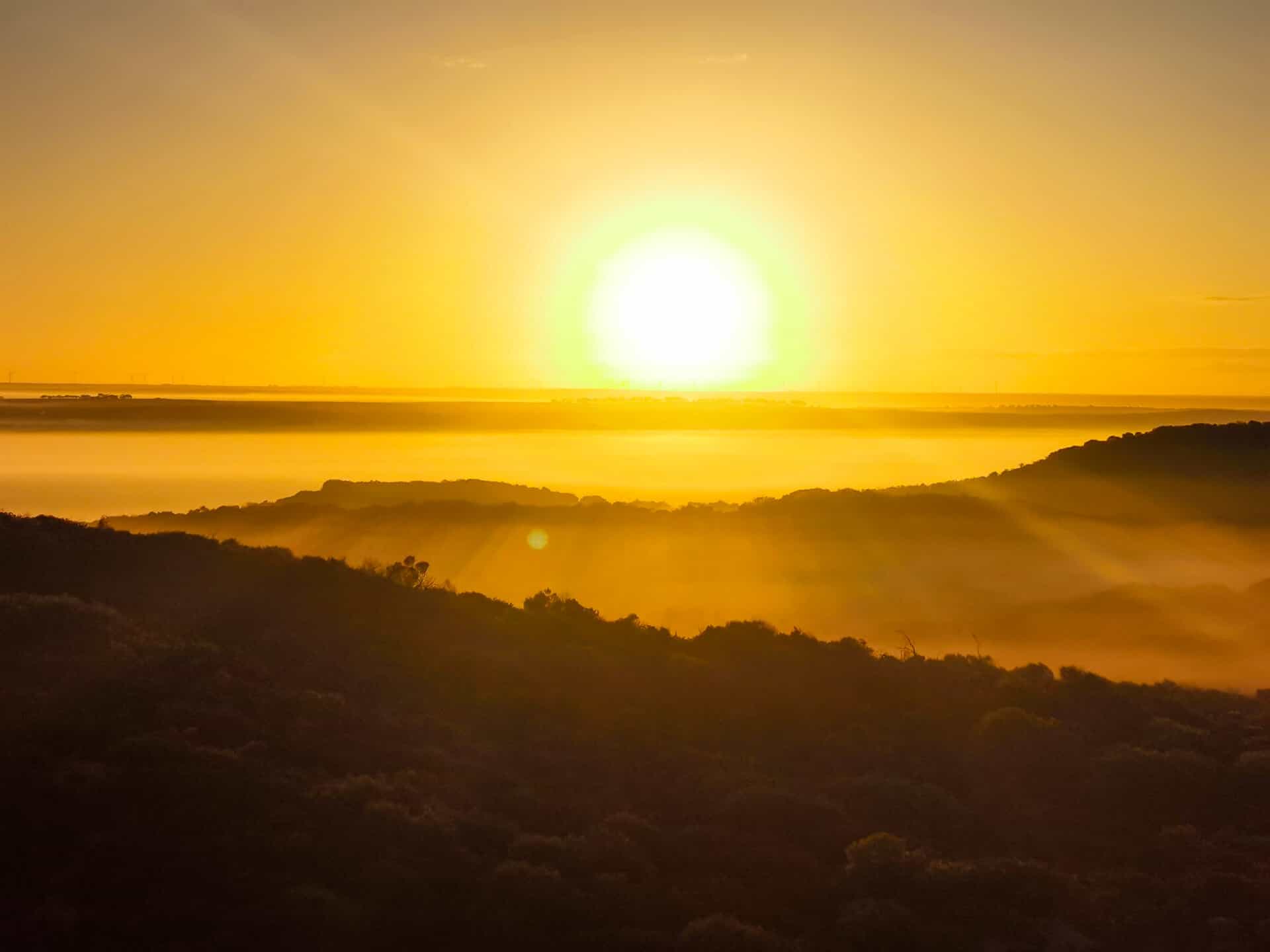 A misty sunrise over the Greenough flats in Western Australia