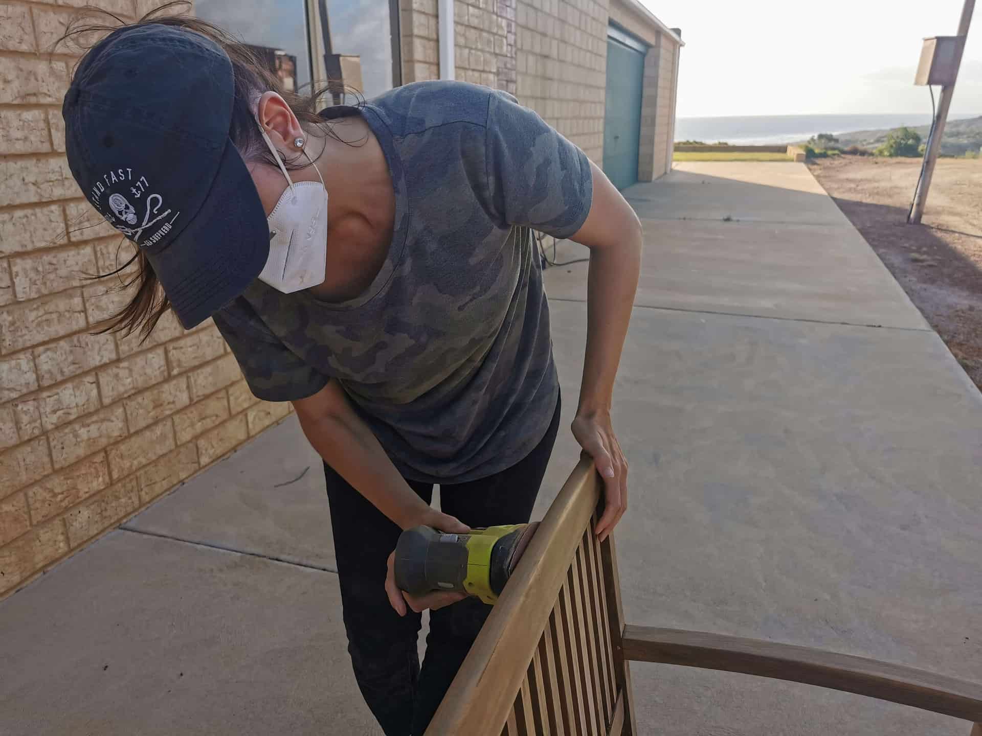 Sanding a bench at The Glass House WA